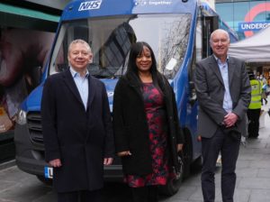 Photo of Lambeth Together leaders outside the Health and Wellbeing Bus in Brixton